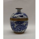 A Chinese pottery blue and white cup and cover, decorated with dragons and clouds,