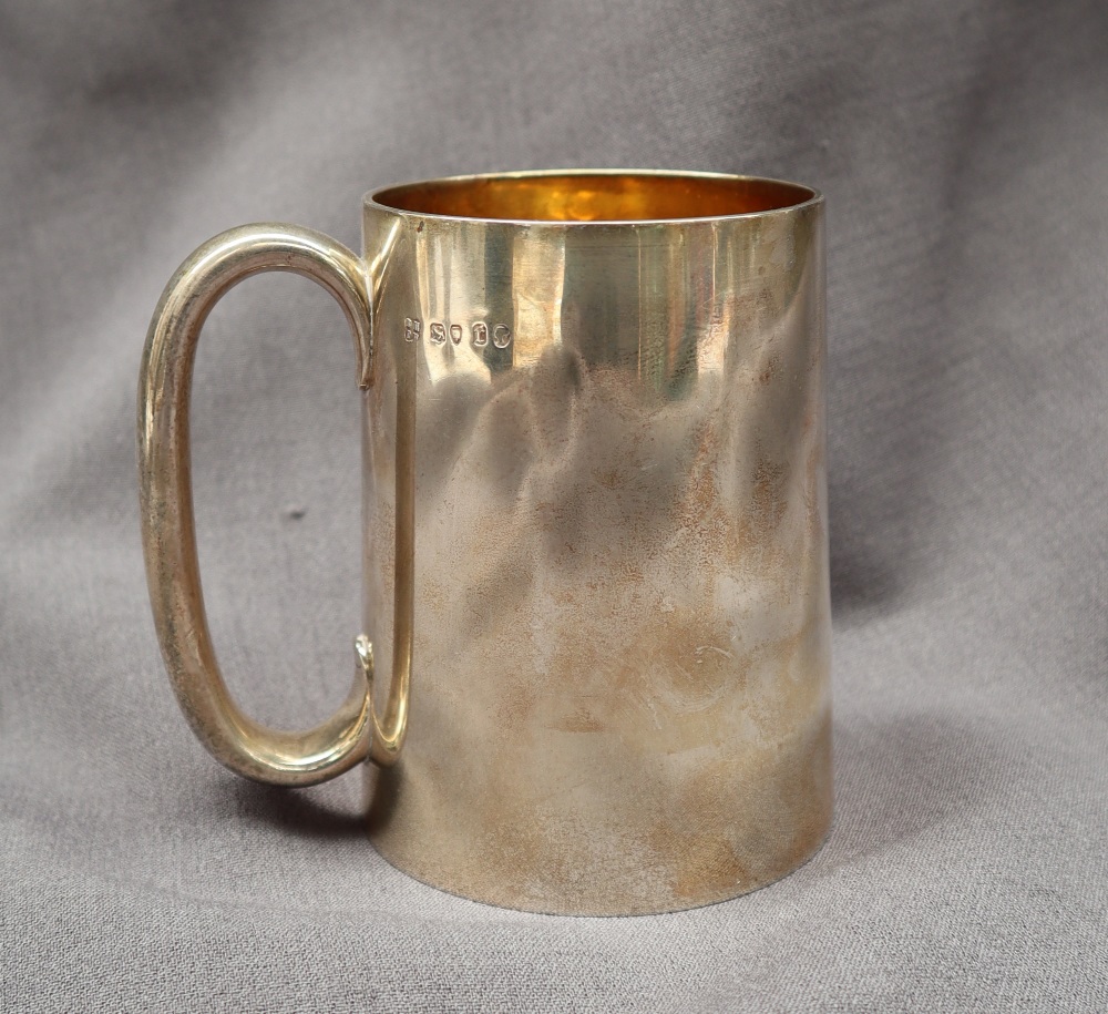 A Victorian silver tankard, of tapering cylindrical form with a gilt interior, London, 1872,