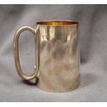 A Victorian silver tankard, of tapering cylindrical form with a gilt interior, London, 1872,