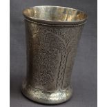 A 19th century Russian silver beaker, of tapering form with a spreading foot decorated with trees,