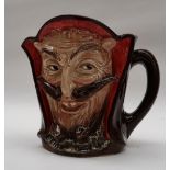 A Royal Doulton character jug of Mephistopheles, 14.