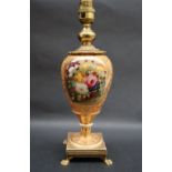 A 19th century porcelain vase converted to a table lamp painted with a spray of garden flowers to