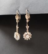 A pair of diamond cluster drop earrings,