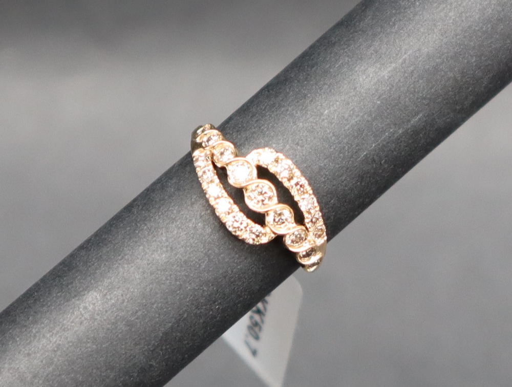 Gemporia - An 18ct gold diamond set ring, of crossover form, totalling 0. - Image 2 of 5