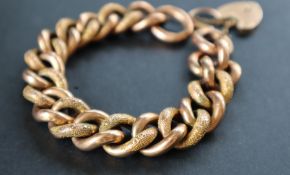 A 9ct gold textured twisted oval link bracelet,