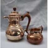 An Elizabeth II silver hot water jug and matching cream jug, of baluster form with ring decoration,