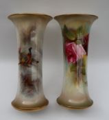 A Royal Worcester porcelain flared vase painted with pheasants in a landscape, signed Jas Stinton,