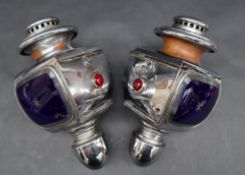 A pair of early 20th century chrome plated lucidus lamps, clear and blue glass panels,