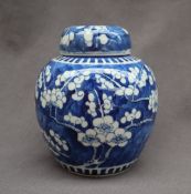 A Chinese prunus blossom ginger jar and cover, four character mark to the base,