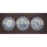 A matched set of three 18th century Chinese porcelain blue and white willow pattern plates,
