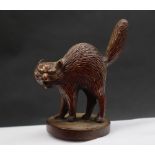 A bronze "Angry Cat" car mascot in the form of a cat with arched back and fluffy tail,