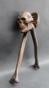 A skull and cross bones nutcracker, Rd No.