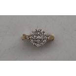Gemporia - An 18ct gold diamond set Tomas Rae ring,