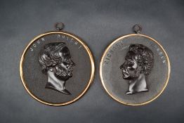 Two Bois Durci portrait roundels of "Richard Cobden" and "John Bright", in copper and brass frames,