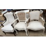 A continental upholstered wing back chair with pad upholstered back,