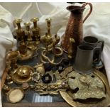 Brass candlesticks together with other brass wares, copper jug,