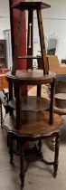 An Arts and Crafts oak occasional table with an hexagonal top and three legs together with two