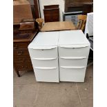 A pair of three drawer filing cabinets (locked and no keys)