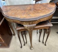 A 20th century burr walnut side table together with a nest of three tables