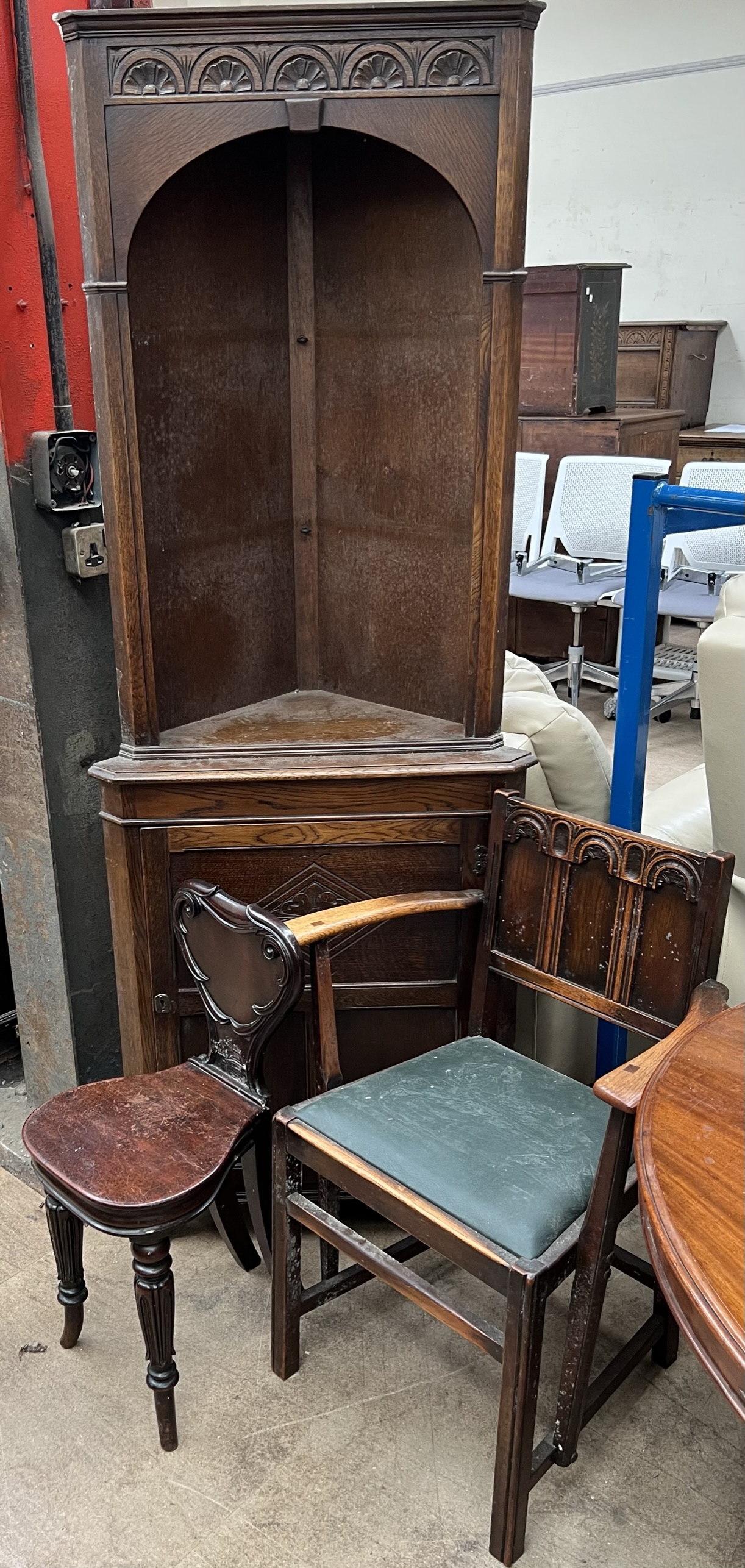 A Victorian mahogany hall chair together with an oak elbow chair and an oak standing corner