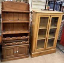 A 20th century pine waterfall bookcase and wine rack,