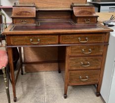 A lady's mahogany writing desk with a raised galleried superstructure,