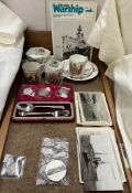 A cased silver christening set together with warship postcards, coronation porcelain,