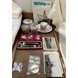 A cased silver christening set together with warship postcards, coronation porcelain,