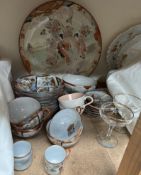 A Japanese satsuma pottery charger together with part tea sets,