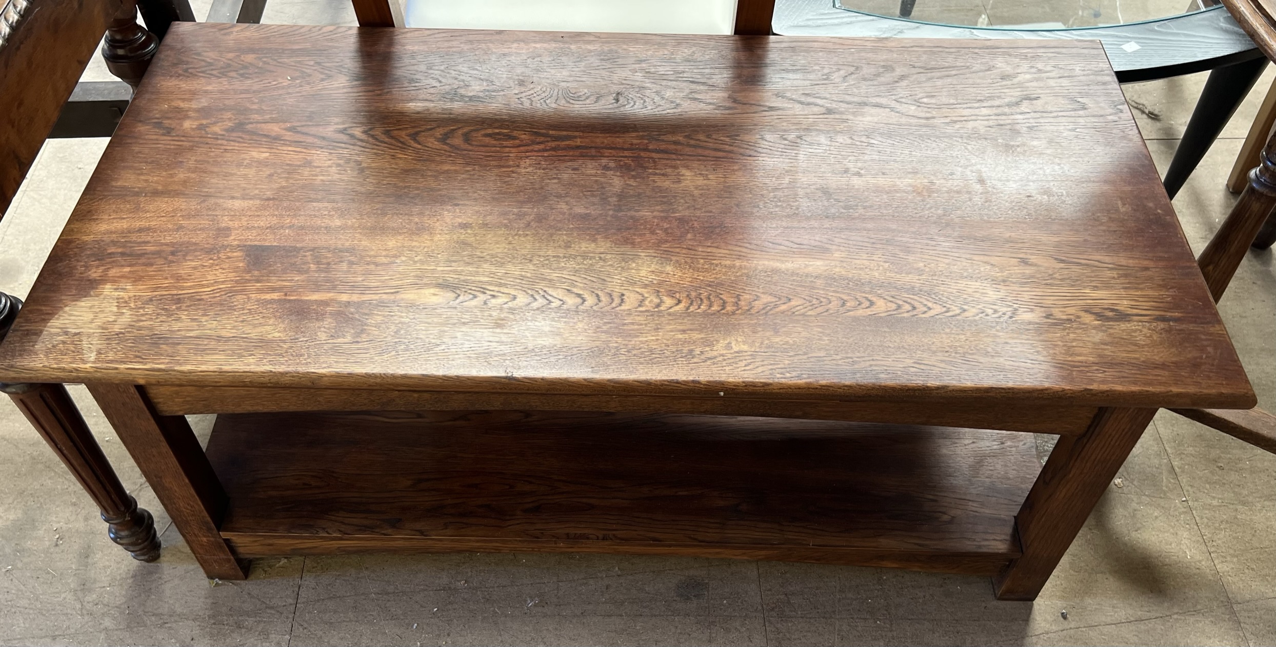 A Victorian style mahogany side table with a raised back and two drawers on tapering legs together - Bild 3 aus 3