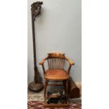 A carved Chinese standard lamp together with an elbow chair and singer sewing machine