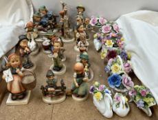 A collection of assorted Hummel figures, together with Royal Adderley floral baskets,