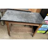 A Victorian marble topped washstand with a rectangular top on turned legs and an undertier
