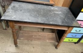 A Victorian marble topped washstand with a rectangular top on turned legs and an undertier