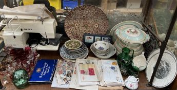 A Singer sewing machine together with a Royal Doulton charger, part dinner sets, stamps,
