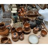 A set of four pottery bricks together with a stoneware bottle dated 1914, a pottery tea set,