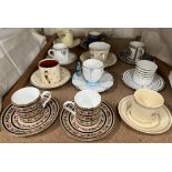 An Aynsley butterfly handles cup and saucer, together with a Susie Cooper coffee can and saucer,