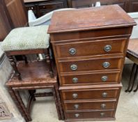 A 20th century mahogany chest on chest together with a stool and a nest of two faux bamboo tables