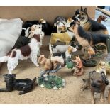 A collection of resin dog and bird figures etc