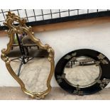 A gilt framed wall mirror with a scrolling leaf surmount together with a convex wall mirror