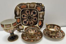 Two Royal Crown Derby cups and saucers together with a matching goblet and a square plate