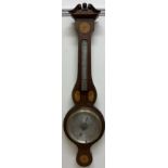 A 19th century mahogany banjo barometer, with a broken swan neck pediment above an inlaid rosette,