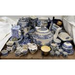 A large blue and white pottery tea pot together with a collection of blue and white pottery etc