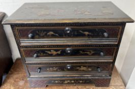 A Chinoiserie decorated chest with a rectangular top above three long drawers on bracket feet, 66.