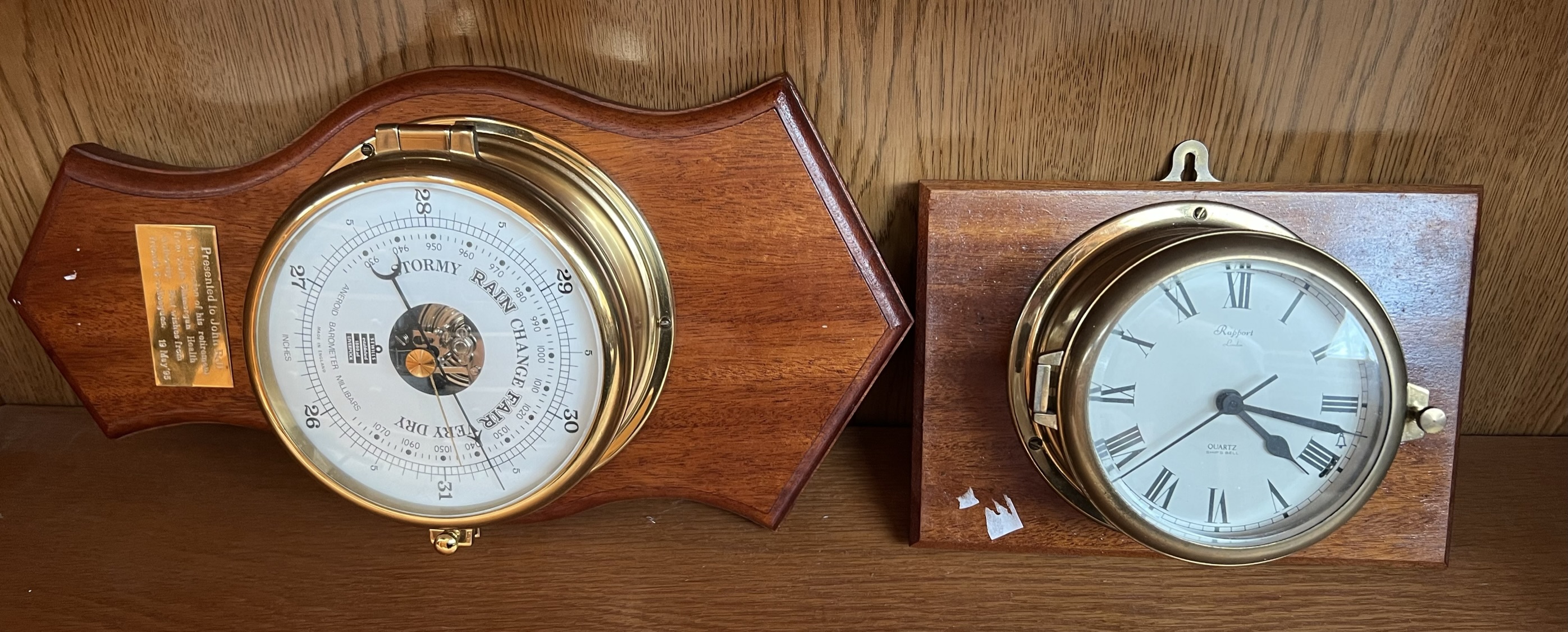 An aneroid barometer together with a Rapport bulkhead timepiece