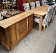A 20th century oak refectory type dining table on square legs,