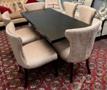 A modern black ash dining table of rectangular form on a U shaped support and rectangular base