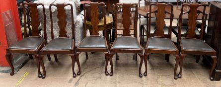 A set of six Queen Anne style mahogany dining chairs with a vase splat and drop in seats on