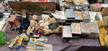 A Steiff teddy bear together with other teddy bears, a Halbig bisque head doll,