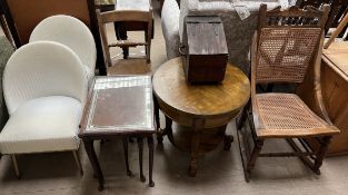 A pair of wicker effect chairs together with a nest of three tables, a kitchen chair,